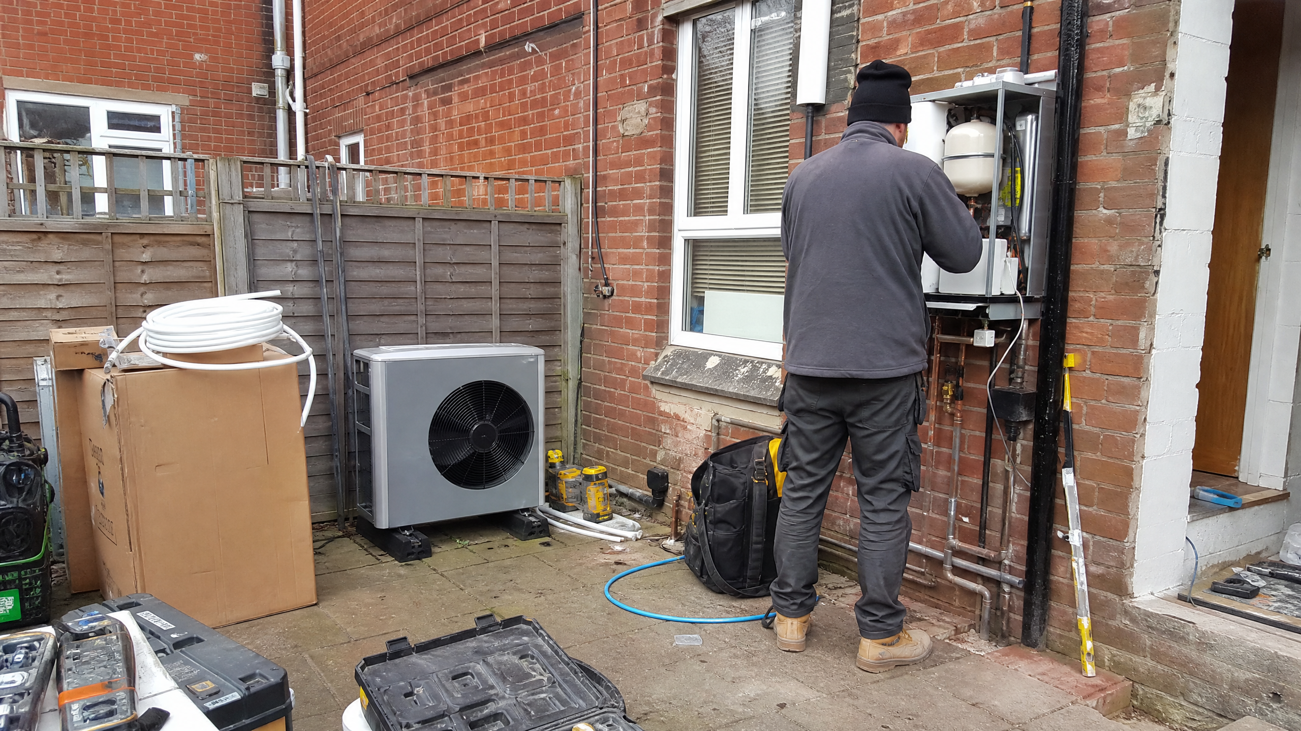 Gas Boiler to Heat Pump Replacement in progress at a British residential property — professional service in Walsall